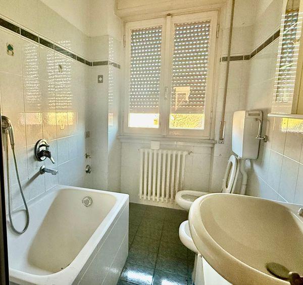 Residenza bifamiliare con giardino in zona centrale