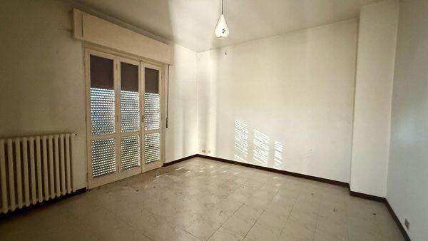 Abitazione bifamiliare con giardino nel cuore della città